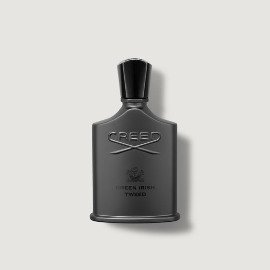 Green Irish Tweed Creed Green Irish Tweed perfume bottle on a light gray background